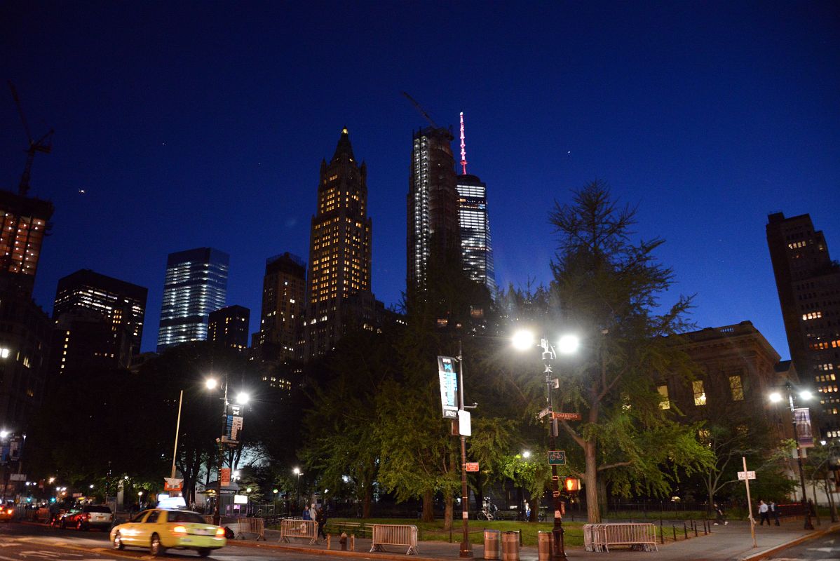 11-1 Woolworth Building, 30 Park Place And One World Trade Centre Above New York City Hall Park At Night In New York Financial District